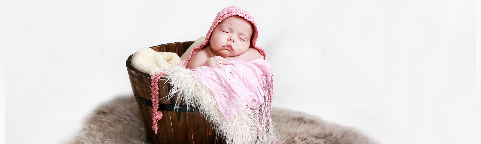 photograph of a sleeping newborn baby
